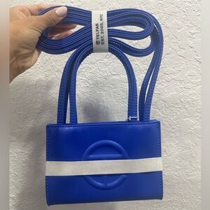 Telfar blue tape mini bag